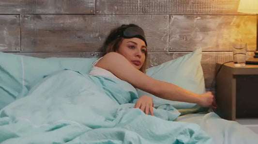 woman in bed who Maintains a Healthy Sleep Hygiene