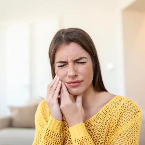 woman with teeth pain Mouth Breathing Predisposes Increased Risk of Periodontal Disease