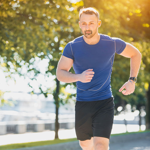 Man running with Myotape for sports showing why Nasal breathing is Important in the Control of Asthma